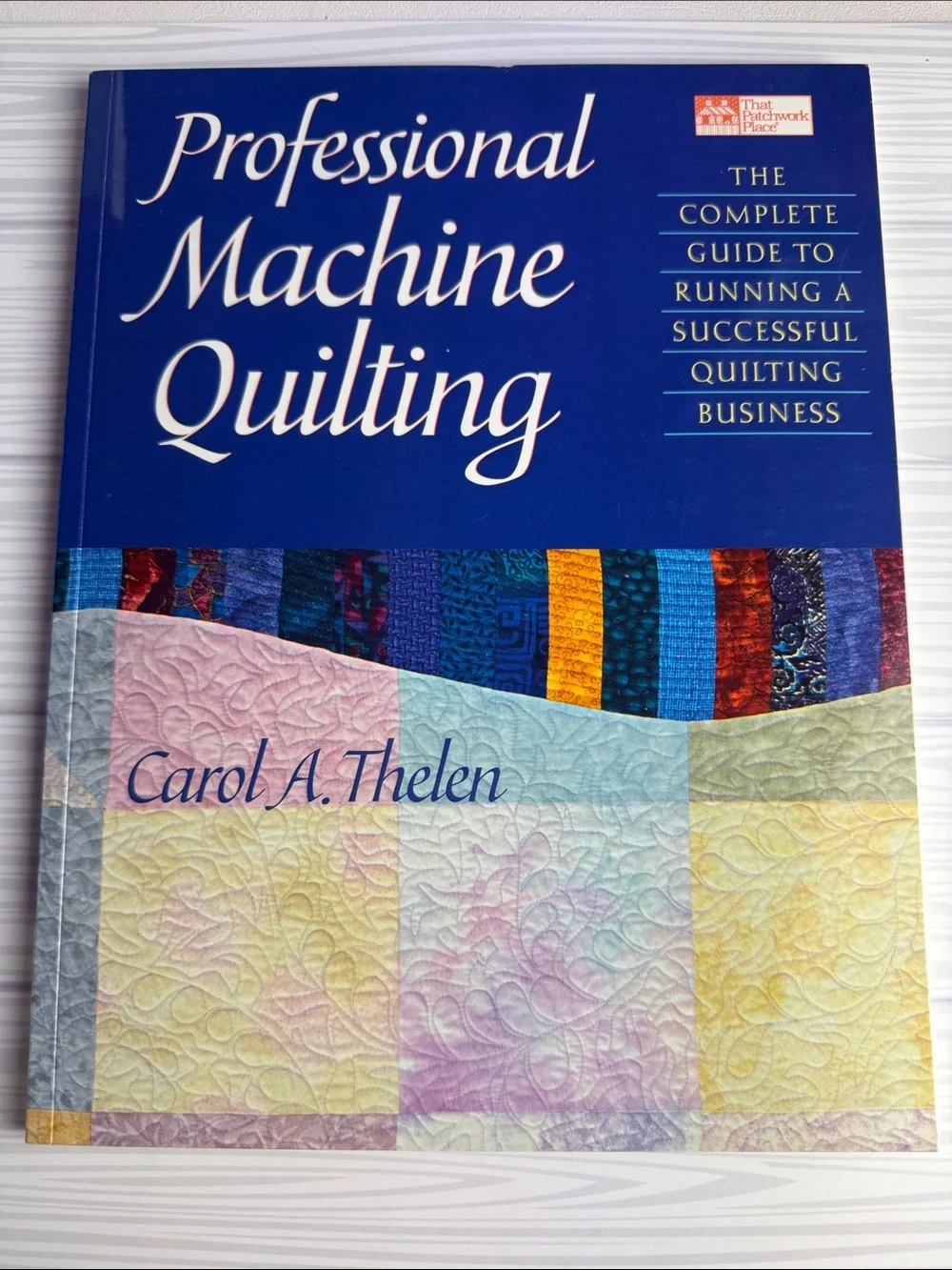 Professional Machine Quilting by Carol A. Thelen - Blue Cover